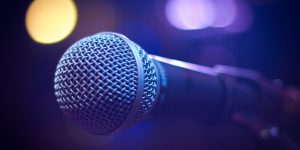 tilt shift photograph of gray and black microphone